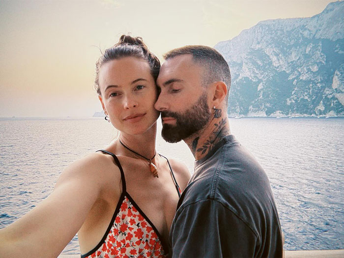 Victoria’s Secret Angel with a new unrecognizable look posing by the sea with a man against a mountainous background. Victoria’s Secret Angel with a new unrecognizable look posing by the sea with a man against a mountainous background.