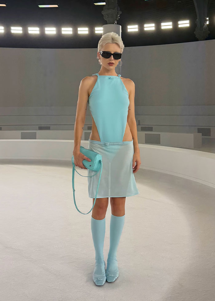 Celebrity wearing a light blue cut-out dress and matching accessories at Paris Fashion Week 2025 showcasing best and worst looks.