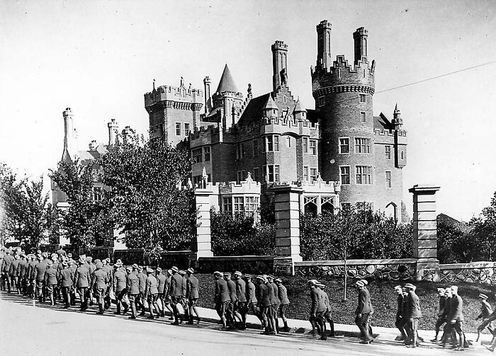 Historic haunted castle with soldiers walking by, one of the spooky destinations so haunting for Halloween visits.