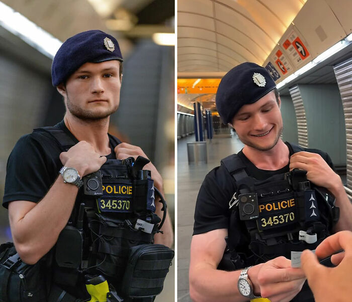 Police officer wearing tactical gear showing honest reactions looking at his own portrait captured by photographer