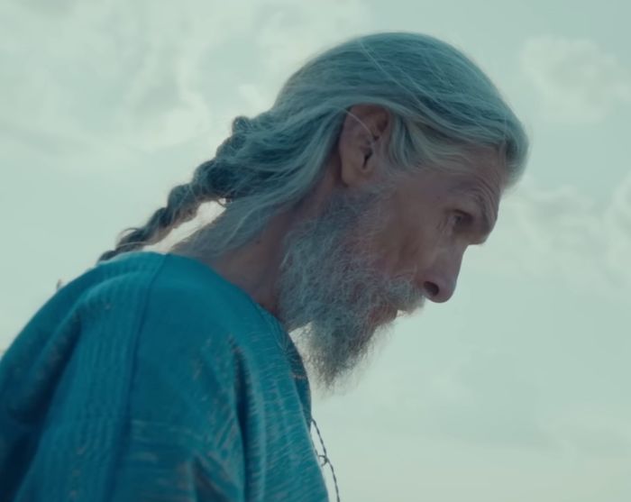 Elderly actor with long braided hair and beard, portraying the tragic life of the most beautiful boy in the world.