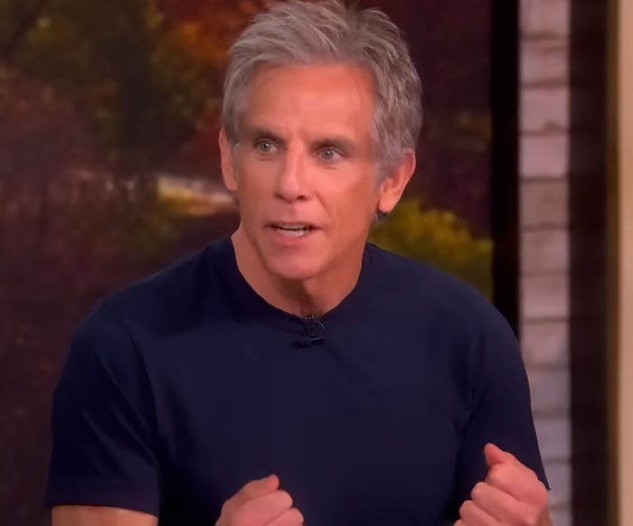 Ben Stiller speaking in a TV interview, wearing a navy shirt, discussing parenting mistakes and nepotism criticism. Ben Stiller speaking in a TV interview, wearing a navy shirt, discussing parenting mistakes and nepotism criticism.
