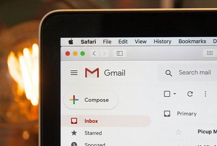 Gmail inbox open on a laptop screen, illustrating digital loopholes in email management and navigation.