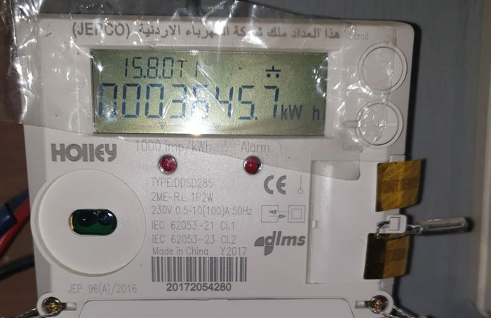 Electric meter with tampering device attached, illustrating a clever loophole people accidentally discovered and used.