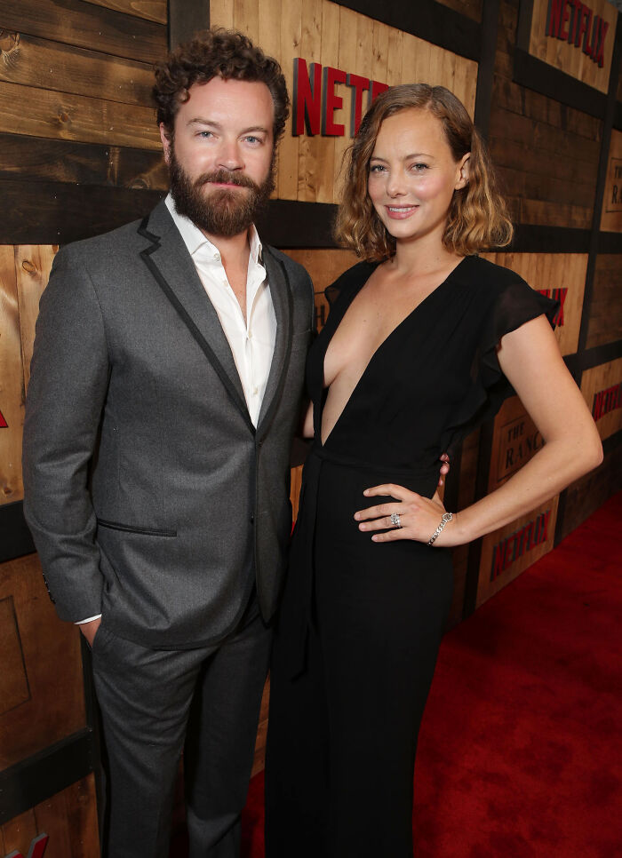 Danny Masterson and Bijou Phillips posing on red carpet at Netflix event, highlighting Bijou Phillips cutting ties.