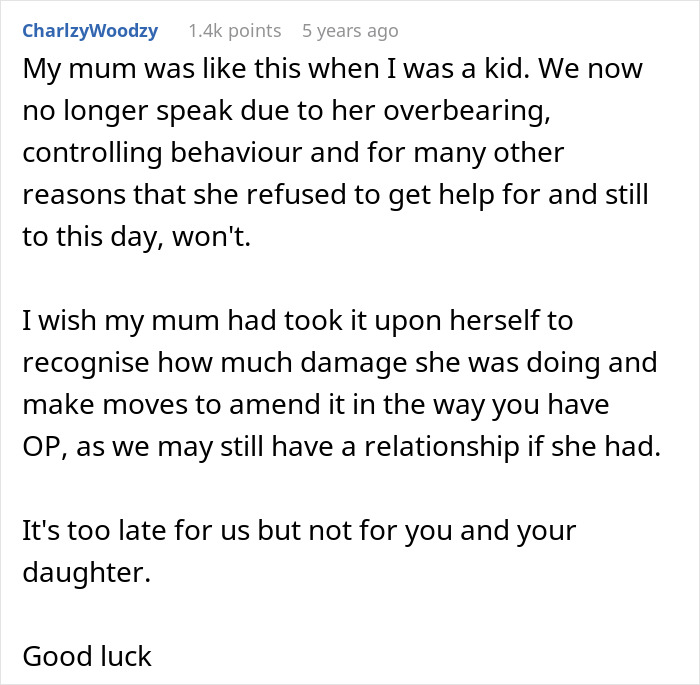 clean-f***k mom organizing clothes drawers with her daughter, both smiling and folding clothes neatly together