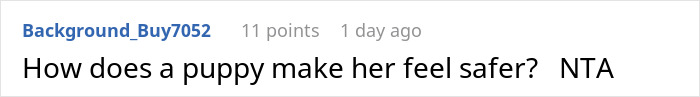 Man upset holding unwanted puppy, overwhelmed by new pet responsibility in a home setting.