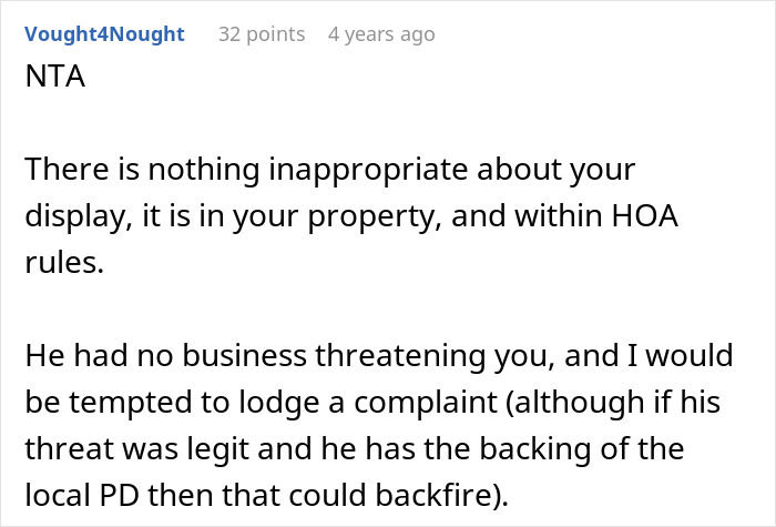 Screenshot of a comment discussing a neighbor threatening a couple over their Halloween decor within HOA rules.