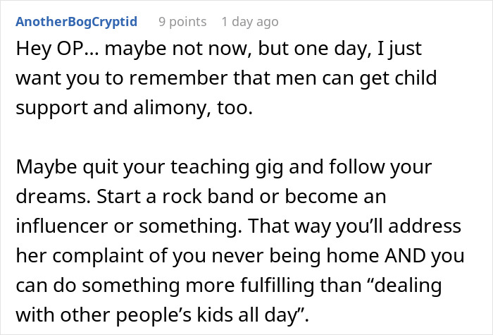 Man upset holding unwanted puppy, overwhelmed by new pet responsibility in a cluttered living room setting.