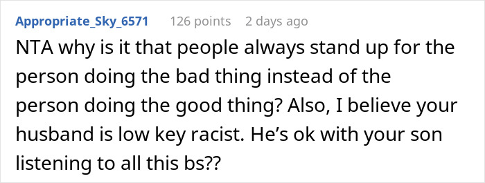 Screenshot of a Reddit comment discussing a wife confronting her brother-in-law for racist slurs during a family dinner.