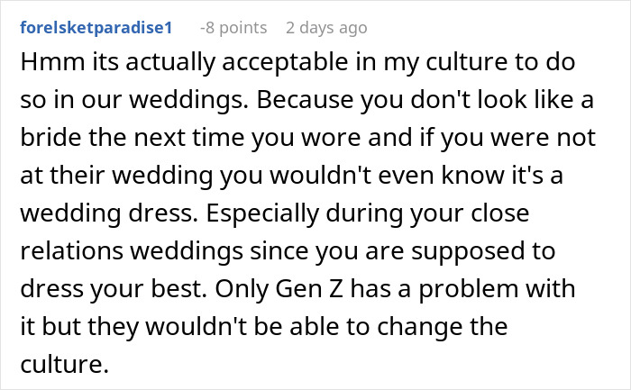 Guest wearing own wedding dress at a formal event, blending tradition and personal style with elegant attire.