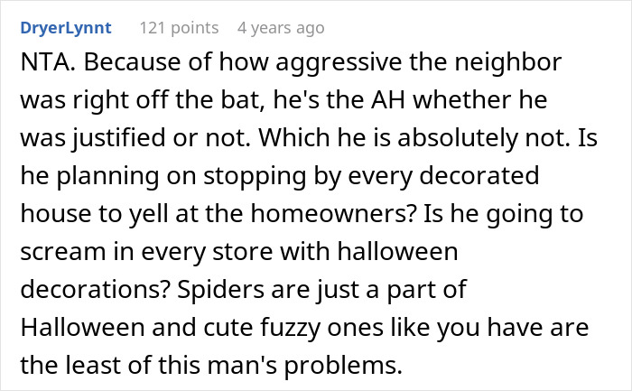 Screenshot of an online comment defending a couple&rsquo;s Halloween decor against a threatening neighbor complaint.