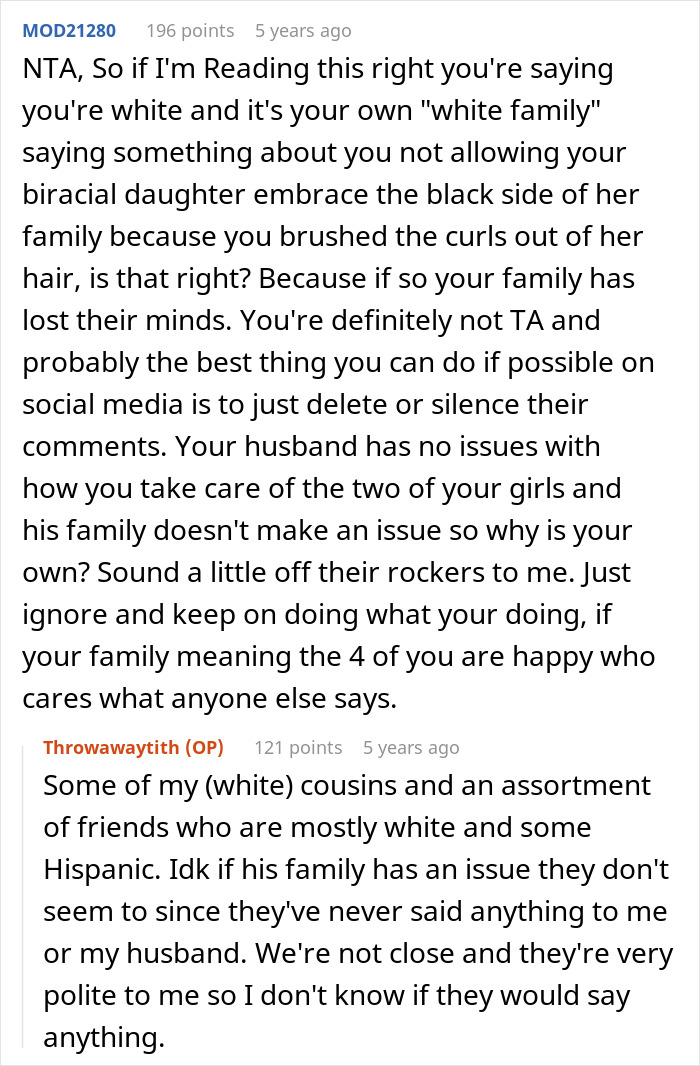 Screenshot of a Reddit thread discussing mom getting slammed by woke folks over brushing out biracial daughter&rsquo;s curls.