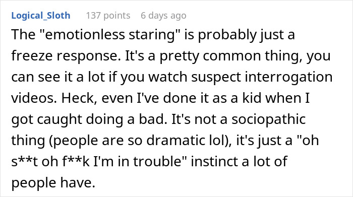 Screenshot of an online comment explaining emotionless staring as a freeze response during suspect interrogations.