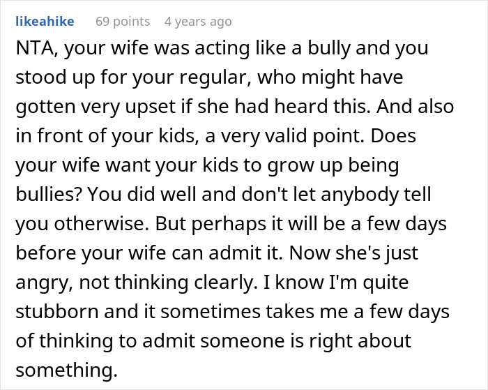 Screenshot of a comment discussing a wife acting like a bully and the husband's response about bullies and family impact.