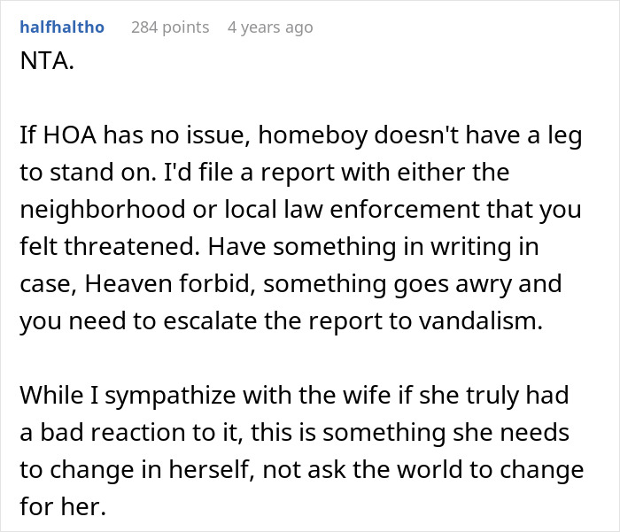 Comment discussing neighborhood dispute and threats related to couple's Halloween decor and neighbor complaints.