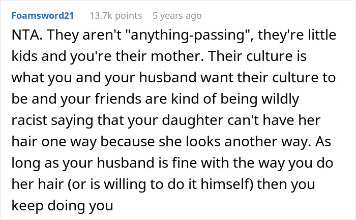 Comment discussing mom criticized by woke folks for whitewashing after brushing out biracial daughter's curls in online forum post.