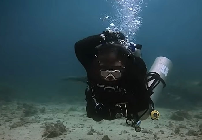Diver underwater captured in chilling found footage, highlighting some of the creepiest videos ever recorded.