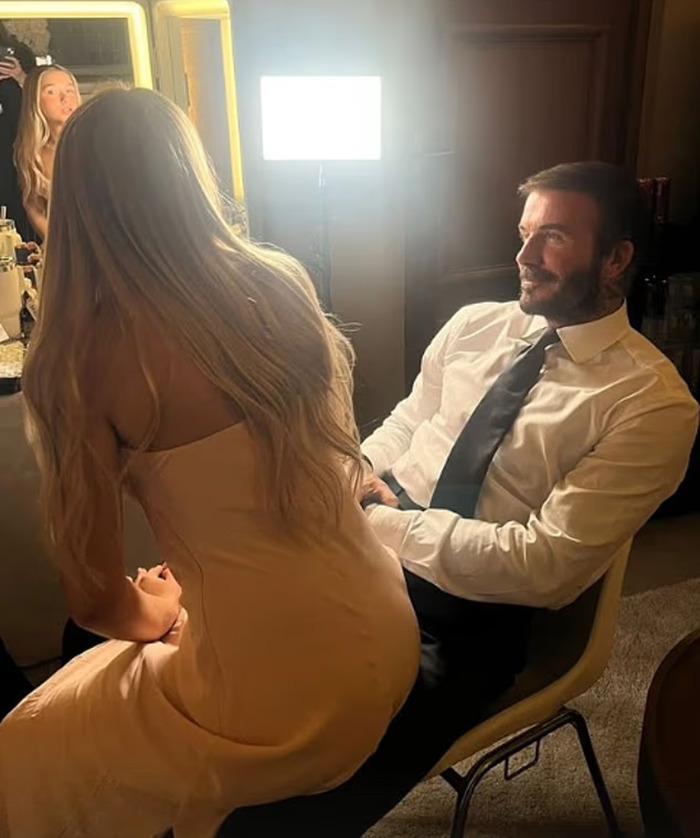 David Beckham sitting with his daughter on his lap, sparking discussion about their very creepy relationship.