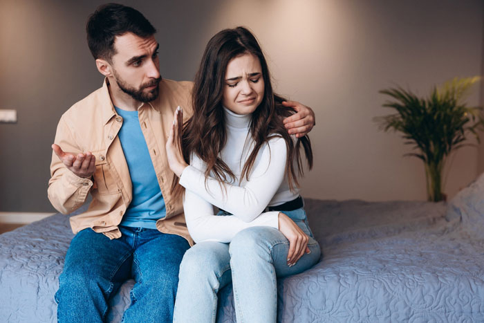 Man uses boys trip excuse as disguise for affair while woman shows distress and refuses to engage during serious talk at home.