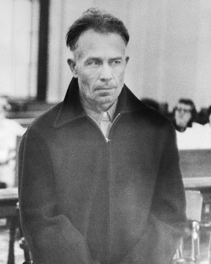 Black and white photo of Ed Gein in court, related to details in Netflix's Monster The Ed Gein story that were fabricated.