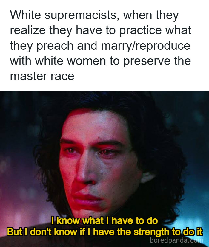 Man with a serious expression illuminated by red light, reflecting on dystopic societal issues and troubling beliefs.