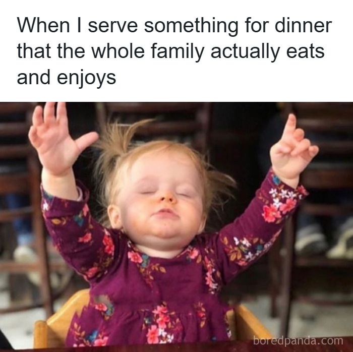 Toddler with closed eyes and raised arms, celebrating a family meal everyone actually enjoys, relatable parenting memes concept.