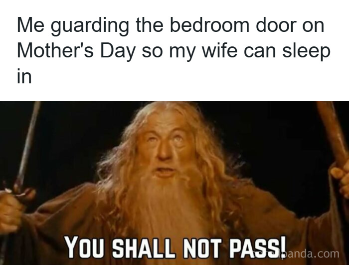 Parenting meme showing a dad guarding a bedroom door to let his wife sleep in on Mother’s Day, referencing relatable humor.