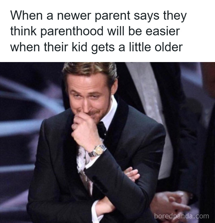Man in a tuxedo smirking with hand on face, illustrating relatable parenting memes about the challenges of parenthood.