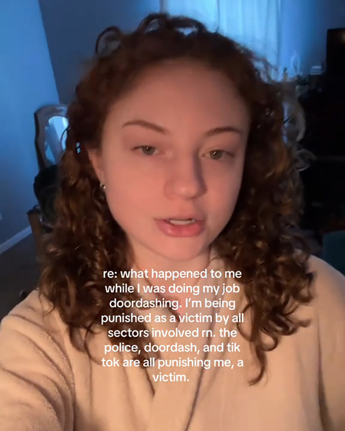 Young woman with curly hair sharing her story about being fired for exposing customer with no underwear, sparking debate. Young woman with curly hair sharing her story about being fired for exposing customer with no underwear, sparking debate.