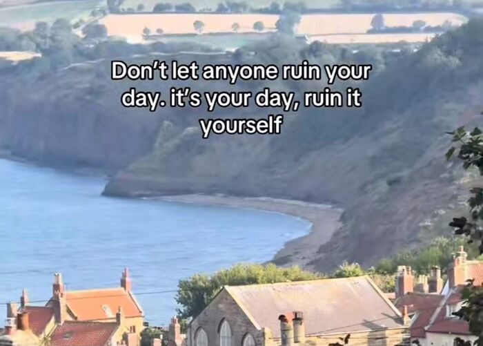 Scenic coastal view with humorous text about self-ruining your day, illustrating relatable memes to help cope with anxiety.