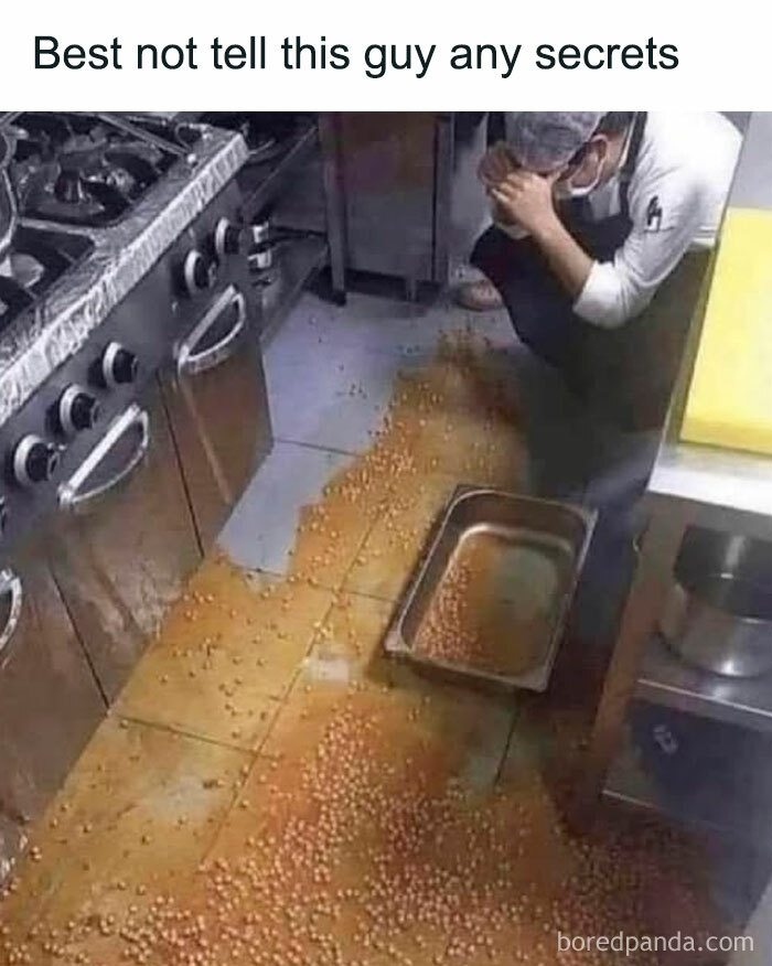 Kitchen worker upset after spilling food on the floor, a relatable meme about everyday kitchen accidents for meme lovers.