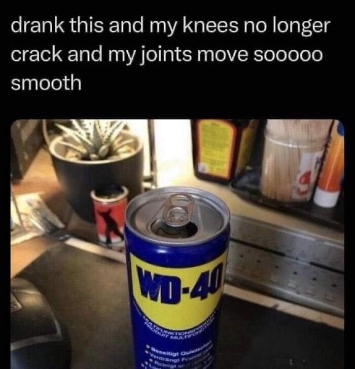 Can with WD-40 opened like a drink can on a desk, humorous meme about joints moving smoothly after drinking it.