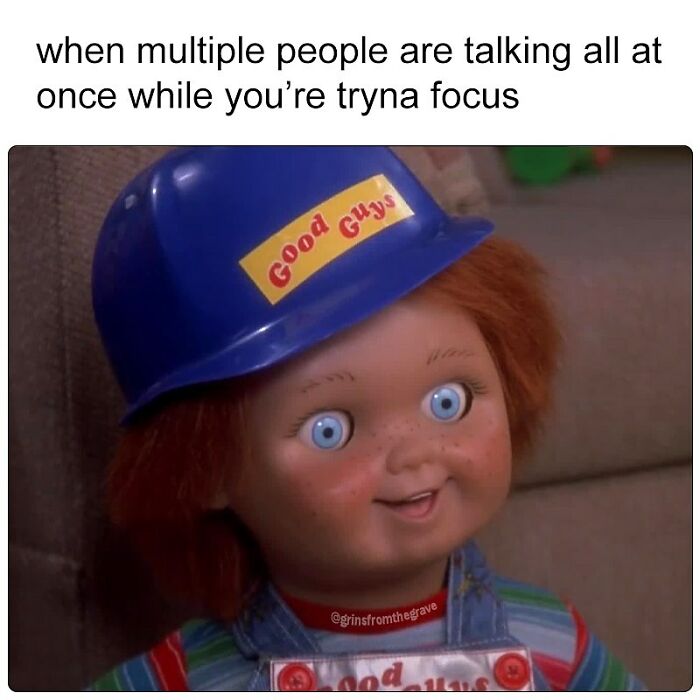 Chucky doll wearing Good Guys helmet, expressing overwhelmed focus in a hilarious horror movie meme.