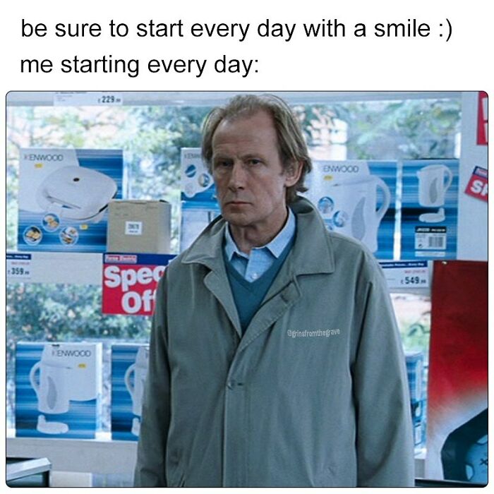 Man in a coat with a deadpan expression inside a store, illustrating a hilarious horror movie meme reaction.