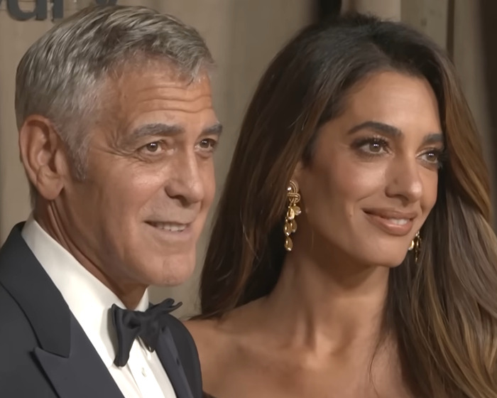 George Clooney and Amal Clooney posing together, George Clooney addressing allegation in Virginia Giuffre Epstein memoir.