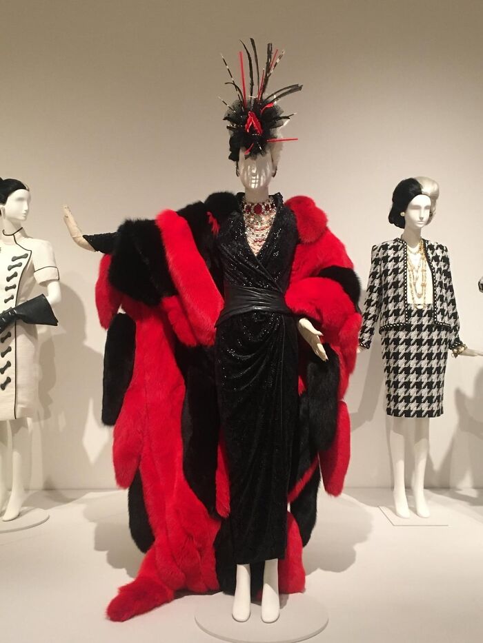 Mannequins dressed in elaborate fashion outfits displayed in a museum exhibit about drunk fumbles and fails.