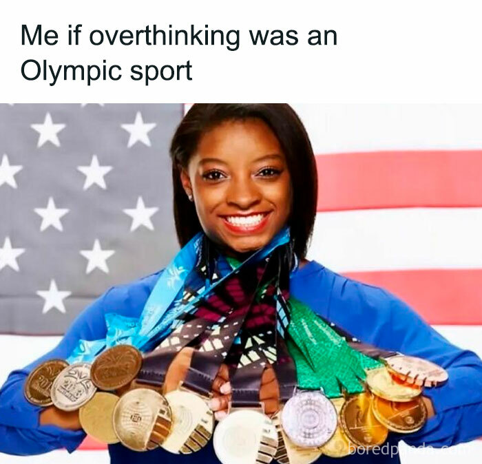 Smiling woman wearing many medals with text about overthinking, a relatable meme for hilarious work stress relief.