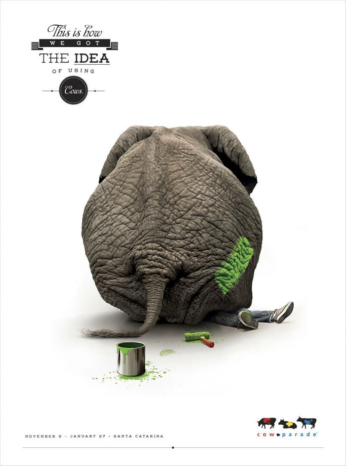 Elephant in a creative ad campaign with green paint on its side, highlighting elephants in advertising.