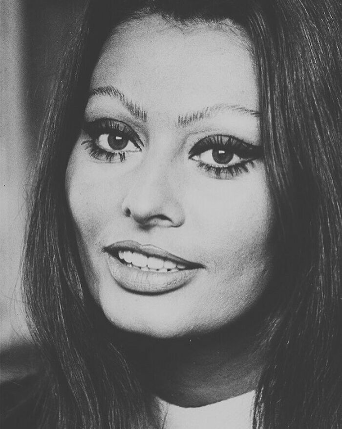 Close-up black and white portrait of Sophia Loren showcasing Italian beauty and classic Hollywood legend style.