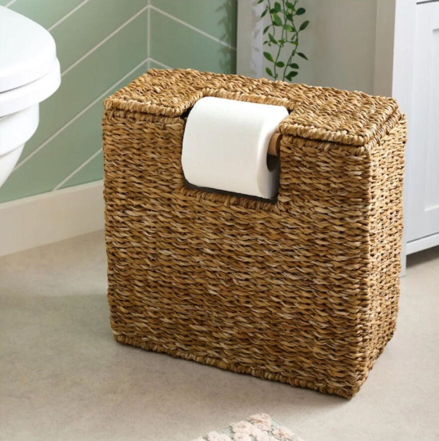 Wicker storage basket with built-in toilet paper holder illustrating smart organization hacks for home spaces.