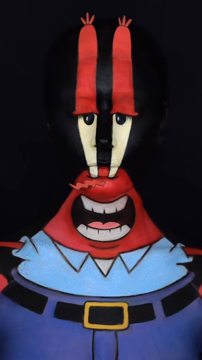 Creative Cliche Halloween makeup transforming a face into a cartoon character with vibrant colors and detailed designs.