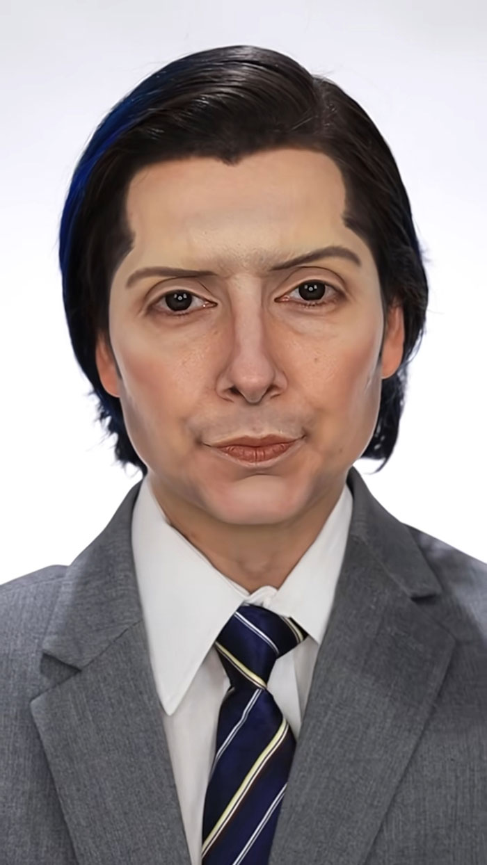 Close-up portrait of a person in a suit showcasing amazing Halloween makeup by Creator Creative Cliche.