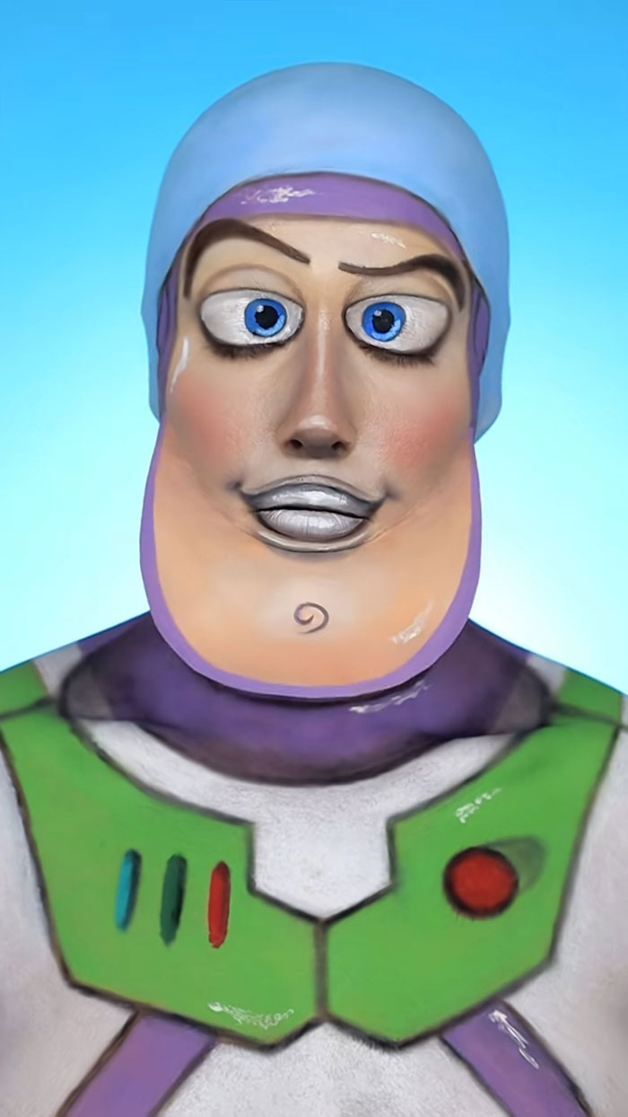 Artist’s Halloween makeup transforming face into a detailed Buzz Lightyear character with vibrant colors and cartoonish features.