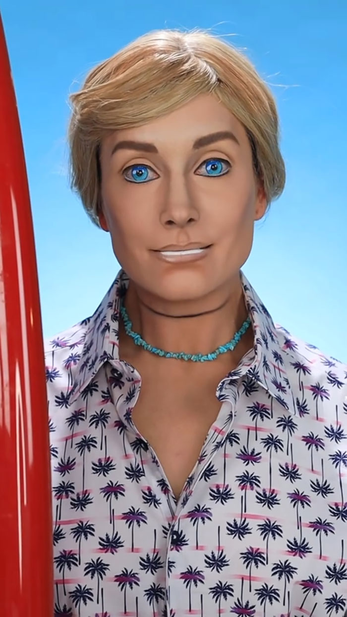 Creative Cliche showcasing amazing Halloween makeup with detailed face art and a tropical-themed shirt against a blue background.