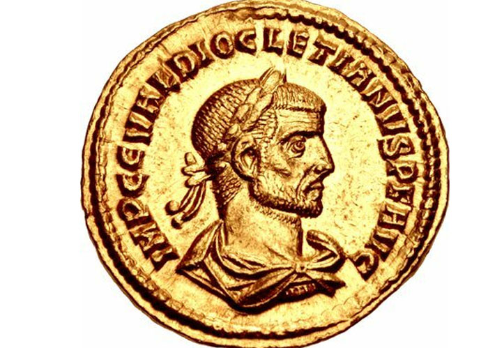 Ancient gold coin featuring a detailed profile bust with inscriptions around the edge, showcasing historical artistry.