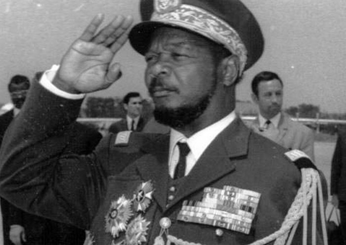 Military officer in decorated uniform saluting during a formal event related to Rihanna slapped him fascinating facts article.