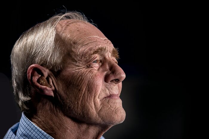 Elderly man with a thoughtful expression, highlighting the theme of shocking and dark secrets that could ruin lives.