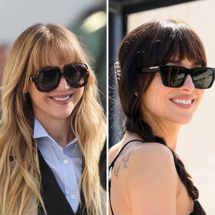 Two women wearing large sunglasses smiling outdoors, capturing the buzz around plastic surgeon trends in LA.