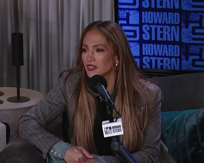 Jennifer Lopez during a Howard Stern interview, discussing personal topics related to her ex-husband and accusations.